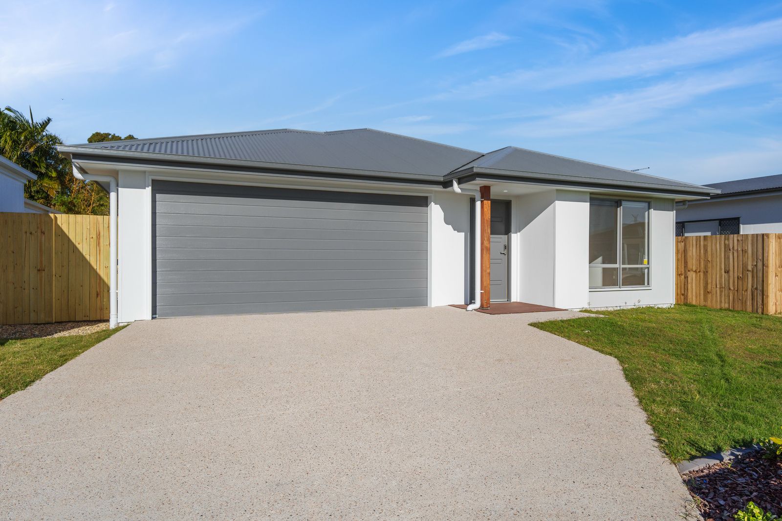 Front exterior with double garage of the SDA home in Caboolture