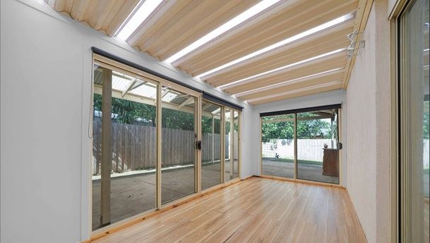 Enclosed sunroom with timber floors